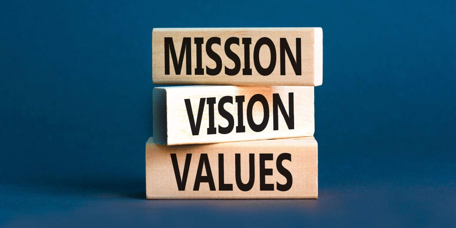 Wooden blocks displaying the words Mission, Vision, and Values